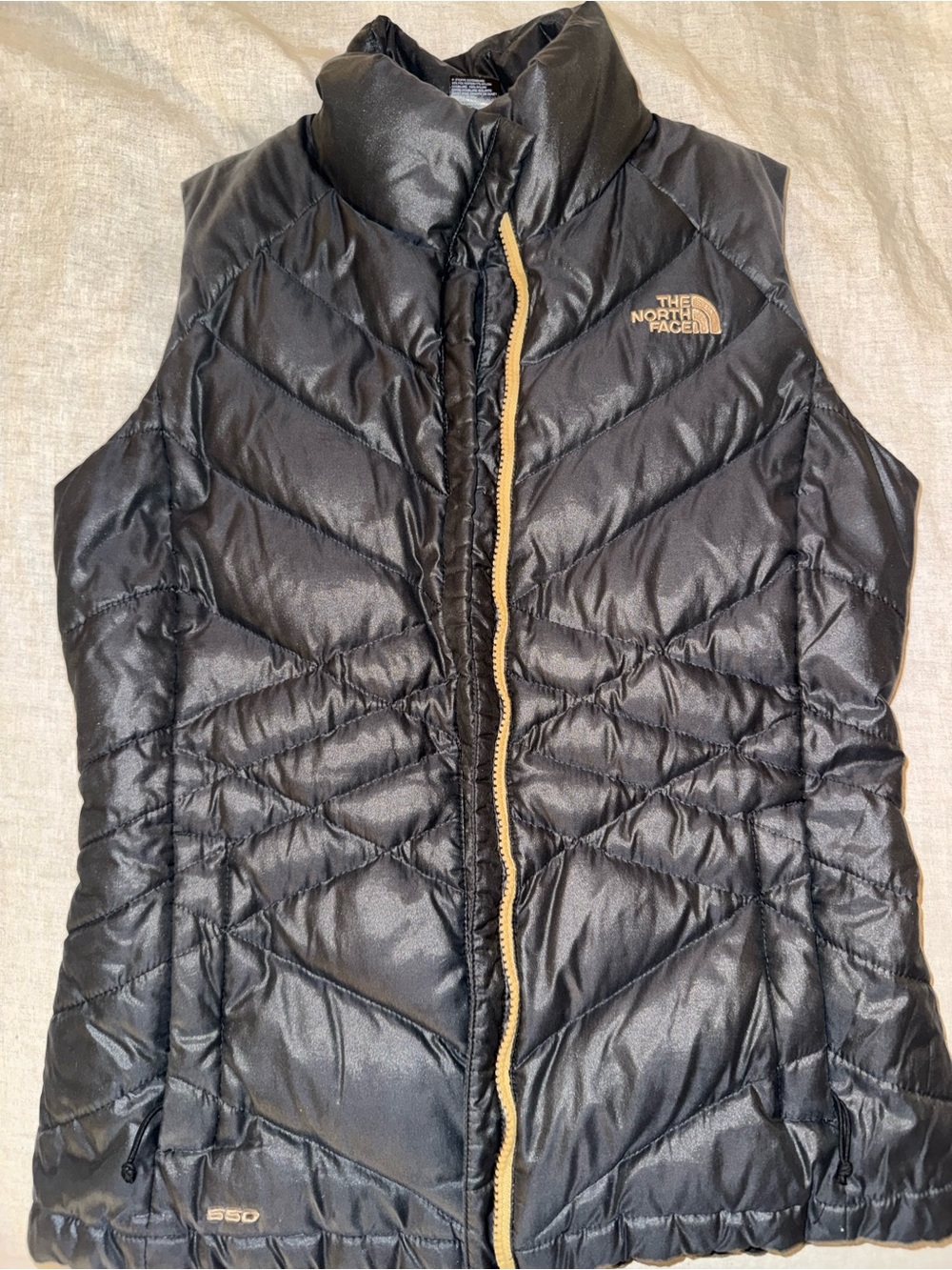 The North Face Black Puffer Vest with Tan Trim